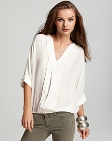 This ultra wide-bodied top from Joie is made in a luscious silk that can be dolled up for a chic night out or dressed down for any weekend. This ultra wide-bodied top from Joie is made in a luscious silk that can be dolled up for a chic night out or dressed down for any weekend.