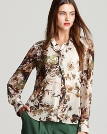 Usher in a romantic style sense in a ruffled Jones New York Collection blouse springing with painterly florals. Usher in a romantic style sense in a ruffled Jones New York Collection blouse springing with painterly florals.
