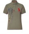 Stylish polo shirt in fine, loden green pique cotton - A modern riff on a venerable classic from Ralph Lauren - Slim, straight cut - Small collar and short button placket - Oversize polo pony logo at chest and chic, graphic print - Hem hangs slightly longer in the back - Casually cool, ideal for everyday leisure - Pair with jeans, chinos or shorts