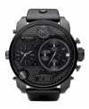 Dark-as-night, industrial-strength style, by Diesel. Watch crafted from black leather strap and round black ion-plated stainless steel case, 65x75mm. Knurled black chronograph dial features applied index, multiple subdials, negative display digital subdial at six o'clock, date window at four o'clock, lugs and logo. Quartz movement. Water resistant to 50 meters. Two-year limited warranty.