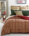 Warm red and brown tones commingle in this Kensington comforter from Lauren Ralph Lauren, featuring an allover plaid pattern for a classic look. Embellished with an embroidered Lauren Ralph Lauren monogram at the base. Reverses to solid red.