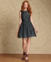 Party pretty in Tommy Hilfiger's classic A-line dress, made from festive plaid silk.