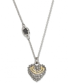 Love that glitters. Juicy Couture's pendant necklace features a darling heart charm embellished with pave crystals. Finished with a gold tone logo banner. Crafted in silver tone mixed metal. Approximate length: 14 inches + 3-inch extender. Approximate drop: 1/2 inch. Love that glitters. Juicy Couture's pendant necklace features a darling heart charm embellished with pave crystals. Finished with a gold tone logo banner. Crafted in silver tone mixed metal. Approximate length: 14 inches + 3-inch extender. Approximate drop: 1/2 inch.