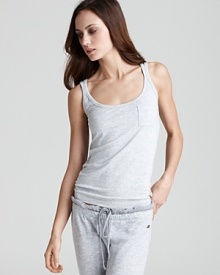 A basic tank top with double straps pairs perfectly with your favorite pajama pants. A basic tank top with double straps pairs perfectly with your favorite pajama pants.