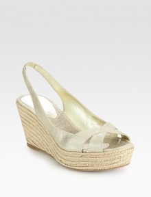 Shimmery metallic leather upper with a stretchy slingback and classic espadrille wedge. Hemp wedge, 3 (75mm)Hemp platform, 1 (25mm)Compares to a 2 heel (50mm)Metallic leather upperLeather liningRubber solePadded insoleImportedOUR FIT MODEL RECOMMENDS ordering one half size up as this style runs small. 