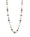 You'll go to great lengths--and look great!--in Charter Club's stylish long station necklace. Made with an array of glass pearls and beads in gold tone mixed metal. Approximate length: 31 inches + 1-1/4-inch extender.