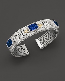 Sterling silver cuff set with faceted white sapphires and corundum. By Judith Ripka. Sterling silver cuff set with faceted white sapphires and corundum. By Judith Ripka.
