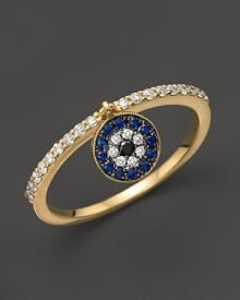 Diamond and sapphire evil eye ring in yellow gold from Meira T. Diamond and sapphire evil eye ring in yellow gold from Meira T.