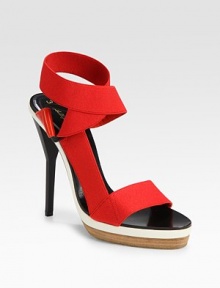 Sleek leather silhouette topped with comfy-cool elastic straps that weave their way around the ankle. Self-covered heel, 5 (125mm)Covered platform, ¾ (20mm)Compares to a 4¼ heel (110mm)Elastic upperLeather liningBuffed leather solePadded insoleMade in ItalyOUR FIT MODEL RECOMMENDS ordering one size up as this style runs small. Sleek leather silhouette topped with comfy-cool elastic straps that weave their way around the ankle. Self-covered heel, 5 (125mm)Covered platform, ¾ (20mm)Compares to a 4¼ heel (110mm)Elastic upperLeather liningBuffed leather solePadded insoleMade in ItalyOUR FIT MODEL RECOMMENDS ordering one size up as this style runs small.