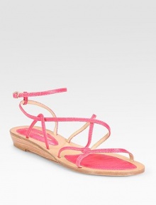Vibrant leather staple with adjustable, ultra-skinny straps and a slightly stacked wedge. Leather upperLeather lining and solePadded insoleImported Vibrant leather staple with adjustable, ultra-skinny straps and a slightly stacked wedge. Leather upperLeather lining and solePadded insoleImported