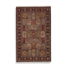A flowing floral border frames a balanced board of organic motifs on this opulent Karastan rug. After weaving, each rug is treated with a special hand wash that infuses the colors with a radiant heirloom patina.
