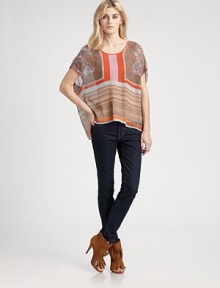 Vibrant florals and woodgrain stripes add a touch of bohemian chic to this breezy topper.ScoopneckOpen shouldersShort sleevesContour hemAbout 28 from shoulder to hemPolyesterDry cleanMade in USA of imported fabricModel shown is 5'11 (180cm) wearing US size Small. Vibrant florals and woodgrain stripes add a touch of bohemian chic to this breezy topper.ScoopneckOpen shouldersShort sleevesContour hemAbout 28 from shoulder to hemPolyesterDry cleanMade in USA of imported fabricModel shown is 5'11 (180cm) wearing US size Small.