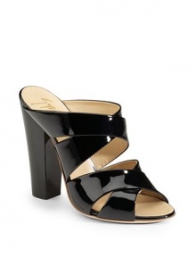 THE LOOKCross-over strapsOpen backTHE FITSelf-covered heel, 5½ (140mm)THE MATERIALPatent leather upperLeather lining and soleORIGINMade in Italy THE LOOKCross-over strapsOpen backTHE FITSelf-covered heel, 5½ (140mm)THE MATERIALPatent leather upperLeather lining and soleORIGINMade in Italy