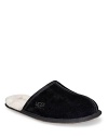 Suede mule style slippers, fully lined in sheepskin. Genuine sheepskin sockliner that naturally wicks moisture away and keeps your feet dry. Lightweight, sueded bottom with embossed logo.