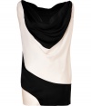 Super stylish black and white draped front top from Donna Karan - Get high style effortlessly with this chic monochromatic top - Black and white all-over pattern with a dramatic draped neckline - Style with leather paneled leggings, an edgy leather jacket, and platform booties