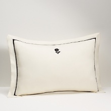 This sophisticated bedding features embroidered daisies and dots. The scalloped edges are accented with contrast piping that carries through to the bold borders on the accompanying shams. The bedskirt features a split corner pleat, finished with an all-around tailored black ribbon. This sophisticated bedding features embroidered daisies and dots. The scalloped edges are accented with contrast piping that carries through to the bold borders on the accompanying shams. The bedskirt features a split corner pleat, finished with an all-around tailored black ribbon.