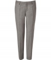 Stylish pants in fine, grey wool - Fashionable slim, straight and ankle-length cut - With flattering pleats - Luxurious, yet relaxed at the same time - Two diagonal side pockets - High quality and wonderfully comfortable - A favorite pair of pants you will wear for a lifetime - Wear with a dress shirt, cashmere pullover, cool shirt