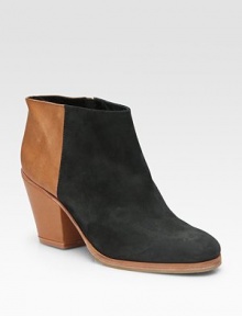 This short boot is twice as nice in a mix of suede and soft leathers.Covered heel, 3 (75mm) Hidden elastic side closure Leather lining and sole Padded insole Imported This short boot is twice as nice in a mix of suede and soft leathers.Covered heel, 3 (75mm) Hidden elastic side closure Leather lining and sole Padded insole Imported