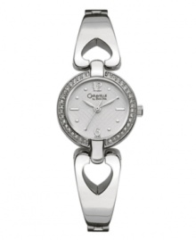 Open your heart. Charming watch by Caravelle by Bulova crafted of silver tone mixed metal bracelet with open heart links and round case. Bezel crystallized with Swarovski elements. Silver tone lattice-patterned dial features applied numerals at twelve and six o'clock, dot markers, stick indices, three hands and logo. Quartz movement. Water resistant to 30 meters. Two-year limited warranty. Open your heart. Charming watch by Caravelle by Bulova crafted of silver tone mixed metal bracelet with open heart links and round case. Bezel crystallized with Swarovski elements. Silver tone lattice-patterned dial features applied numerals at twelve and six o'clock, dot markers, stick indices, three hands and logo. Quartz movement. Water resistant to 30 meters. Two-year limited warranty.