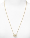 Bring MARC BY MARC JACOBS playful style to your jewel box with this 12-karat gold plated necklace, accented by three enamel rings.