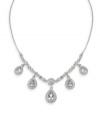 Elegance defined by the finishing touches. Carolee necklace illuminates your neckline with its breathtaking frontal design highlighting five pear-cut glass stones set in silver tone mixed metal. Approximate length: 16 inches + 2-inch extender.