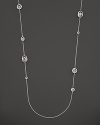 Oval, round and octagon crystals gleam in this long, elegant sterling silver necklace. By Ippolita.
