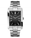 A sophisticated dress watch with a striking black dial, by GUESS.