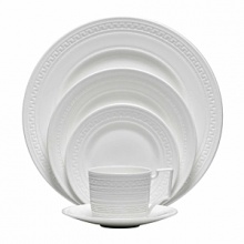 Urban chic and elegance are the hallmarks of the new Intaglio collection from Wedgwood, yet drawing its design inspiration from the delicate embossing of the Georgian era, the fresh white color way is crisp, clean and contemporary. Intaglio highlights the traditional skills of knurling and engine turning, the arts of indenting designs in wet clay to give a distinctive tactile finish. The designs are unique across all the pieces and bring an intricate web of fresh but understated silhouette to the table. Urban chic and elegance are the hallmarks of the new Intaglio collection from Wedgwood, yet drawing its design inspiration from the delicate embossing of the Georgian era, the fresh white color way is crisp, clean and contemporary. Intaglio highlights the traditional skills of knurling and engine turning, the arts of indenting designs in wet clay to give a distinctive tactile finish. The designs are unique across all the pieces and bring an intricate web of fresh but understated silhouette to the table.