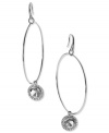 Let your look shine! These hoop earrings from Michael Kors flaunt a circular pendant with a cubic zirconia stone. Crafted in silver tone mixed metal. Approximate drop: 2-1/2 inches.