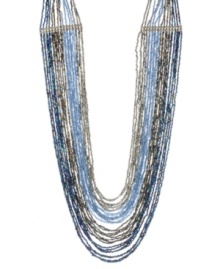 Go to great lengths. Kenneth Cole New York's striking long necklace is elaborately embellished with blue and silver bugle bead strands. Set in hematite tone mixed metal. Approximate length: 32 inches. Go to great lengths. Kenneth Cole New York's striking long necklace is elaborately embellished with blue and silver bugle bead strands. Set in hematite tone mixed metal. Approximate length: 32 inches.