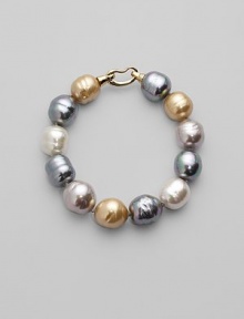 Soft shades come together in a substantial strand of lustrous baroque pearls. 14mm champagne, nuage, grey and white man-made, organic pearls 18k goldplated sterling silver spring clip clasp Length, about 8 Made in Spain Soft shades come together in a substantial strand of lustrous baroque pearls. 14mm champagne, nuage, grey and white man-made, organic pearls 18k goldplated sterling silver spring clip clasp Length, about 8 Made in Spain