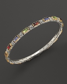 Colorful gemstones embellish this etched sterling silver and 18K gold bangle from Konstantino. Colorful gemstones embellish this etched sterling silver and 18K gold bangle from Konstantino.