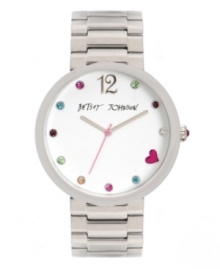 Daydream of rainbows and hearts with this cute Betsey Johnson watch. Polished stainless steel bracelet and round case. White dial features silver tone numeral at twelve o'clock, multicolored crystal markers, pink heart at four o'clock, silver tone hour and minute hands, pink second hand and logo. Quartz movement. Water resistant to 30 meters. Two-year limited warranty. Available exclusively at Macy's!