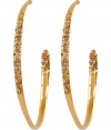 Add a stylish accent to any look with these crystal-embellished hoop earrings from modern jewelry master Alexis Bittar - Gold-tone hoops with crystal embellishment - Pair with a figure-hugging cocktail frock and heels or a boho-chic off-duty ensemble