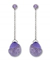 Purple reigns on these regal, elegant linear earrings from Swarovski. Delicately dangling from silver tone mixed metal chains, lovely lilac-hued crystals are adorned by vibrant violet crystal Pointiage for a dazzling effect. Approximate drop: 2-4/10 inches.