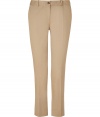 Get the of-the-moment look in these stylish cropped pants from Michael Kors - Zip and button closure, slim fit, ankle-grazing length, front leg crease, two front slash pockets, two back welt button pockets - Pair with a V-neck pullover, bold-shoulder blazer, and wedge booties