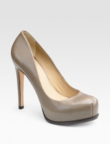 This rich leather staple exudes sophistication.Self-covered heel, 4½ (115mm) Hidden platform, 1 (25mm) Compares to a 3½ heel (90mm) Square toe Leather lining and sole Padded insole ImportedOUR FIT MODEL RECOMMENDS ordering true size.. This rich leather staple exudes sophistication.Self-covered heel, 4½ (115mm) Hidden platform, 1 (25mm) Compares to a 3½ heel (90mm) Square toe Leather lining and sole Padded insole ImportedOUR FIT MODEL RECOMMENDS ordering true size..