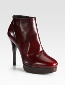 For a street-ready look, this seductive shape of smooth leather with a commanding heel is the ultimate choice. Stacked heel, 5 (125mm)Stacked platform, 1 (25mm)Compares to a 4 heel (100mm)Leather upperSide zipLeather liningRubber solePadded insoleMade in SpainAdditional Information Women's Shoe Size Guide (International Equivalents) For a street-ready look, this seductive shape of smooth leather with a commanding heel is the ultimate choice. Stacked heel, 5 (125mm)Stacked platform, 1 (25mm)Compares to a 4 heel (100mm)Leather upperSide zipLeather liningRubber solePadded insoleMade in SpainAdditional Information Women's Shoe Size Guide (International Equivalents)