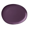 This fashion-forward porcelain dinnerware has signature DVF style - bold, unique, modern. The highly glossed surface, intentionally irregular curves and exposed seams create a chic tablescape and offer infinite styling possibilities. Mix and match with other colors in the Pebblestone collection to create your own signature look.