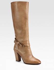 A feminine bow wraps around this tall silhouette, carefully constructed of ultra-soft leather. Self-covered heel, 4 (100mm)Shaft, 15Leg circumference, 13½Leather upperPull-on styleLeather liningLeather and rubber solePadded insoleImported A feminine bow wraps around this tall silhouette, carefully constructed of ultra-soft leather. Self-covered heel, 4 (100mm)Shaft, 15Leg circumference, 13½Leather upperPull-on styleLeather liningLeather and rubber solePadded insoleImported
