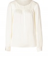 Ultra-sophisticated top in fine, natural white silk - Narrow silhouette with round neck and long, billowing sleeves - Decorative buttons - Fits looks for the office with a pencil skirt and blazer, and causal styles with jeans and flats