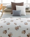 Calvin Klein's Teaflower flat sheet features a delicate floral motif on a warm, tan ground for a look of modern elegance. Finished in 220-thread count combed cotton percale. Also comes in a solid option.
