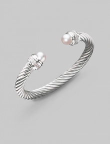From the Silver Ice Collection. A signature Yurman cable of sterling silver, richly enhanced by bands of pavé diamonds encircling lustrous white freshwater pearl end caps. Diamonds, 0.48 tcw White freshwater pearls Sterling silver Cable, 7mm Diameter, about 2¼ Made in USA From the Silver Ice Collection. A signature Yurman cable of sterling silver, richly enhanced by bands of pavé diamonds encircling lustrous white freshwater pearl end caps. Diamonds, 0.48 tcw White freshwater pearls Sterling silver Cable, 7mm Diameter, about 2¼ Made in USA