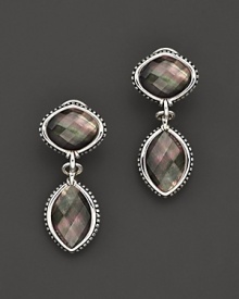 Black mother-of-pearl doublets in gleaming caviar settings of sterling silver. Black mother-of-pearl doublets in gleaming caviar settings of sterling silver.