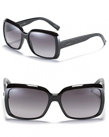 A glamorous pair of square frame sunglasses with gradient lenses, the perfect accessory for poolside lounging. A glamorous pair of square frame sunglasses with gradient lenses, the perfect accessory for poolside lounging.