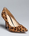 Ladylike leopard on luxe calf hair defines these stylish, pointed toe pumps by Joan & David. They're the cat's meow.