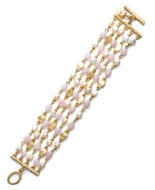 Five polished rows of shimmer. Lauren by Ralph Lauren's pretty bracelet features a trendy toggle clasp and rows of gold discs, freshwater pearls (4 mm) and light pink jade accents. Set in gold tone mixed metal. Approximate length: 7-1/2 inches. Five polished rows of shimmer. Lauren by Ralph Lauren's pretty bracelet features a trendy toggle clasp and rows of gold discs, freshwater pearls (4 mm) and light pink jade accents. Set in gold tone mixed metal. Approximate length: 7-1/2 inches.
