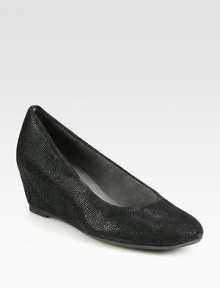 Goose-bump textured nappa leather classic with modern concealed wedge offers the style and comfort you expect from a style this sleek.Covered wedge heel, 1¾ (40mm)Rounded toeUltrasuede liningPadded insoleExclusive initial rubber soleMade in Spain Goose-bump textured nappa leather classic with modern concealed wedge offers the style and comfort you expect from a style this sleek.Covered wedge heel, 1¾ (40mm)Rounded toeUltrasuede liningPadded insoleExclusive initial rubber soleMade in Spain