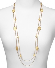 Lauren by Ralph Lauren gives your neckline the Midas treatment with this worn gold tone and pearl necklace. Ever sophisticated, this piece gleams beneath a crisp blouse. Lauren by Ralph Lauren gives your neckline the Midas treatment with this worn gold tone and pearl necklace. Ever sophisticated, this piece gleams beneath a crisp blouse.