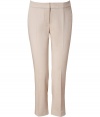 Add luxe a appeal to your wardrobe favorites with these cropped pants from Akris - Flat front, off-seam pockets, back welt pockets, front creased detail, cropped fit - Pair with a cashmere pullover and embellished ballet flats